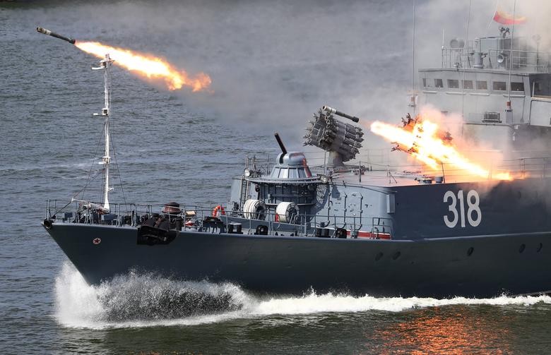The Russian small anti-submarine ship Aleksin fires missiles during the Navy Day parade in Baltiysk, Kaliningrad region, Russia . REUTERS/Vitaly Nevar